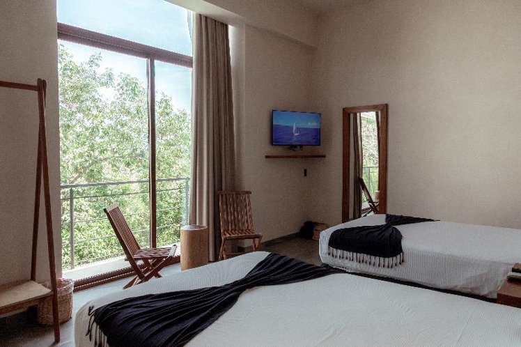 QUADRUPLE DELUXE TWO BEDS Room